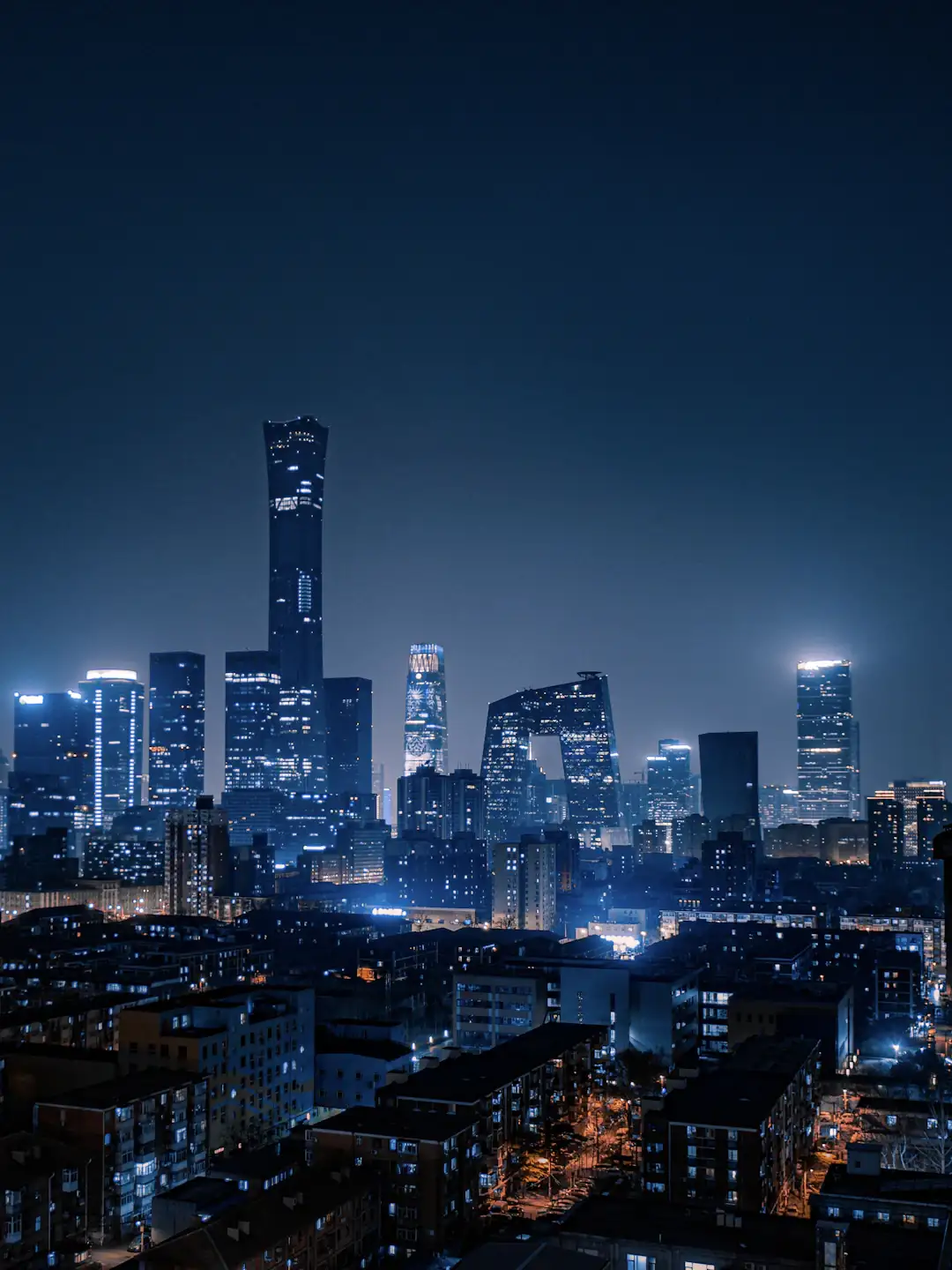 City skyline at night — enhanced result